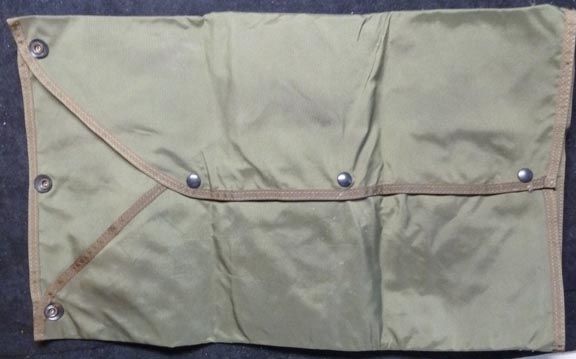 commercial rather than military? 7 x 12 1 /2 nylon tool bag unfolds 