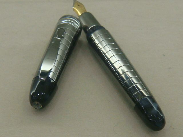 The last picture shows comparison with Montblanc Ugly Duckling 144