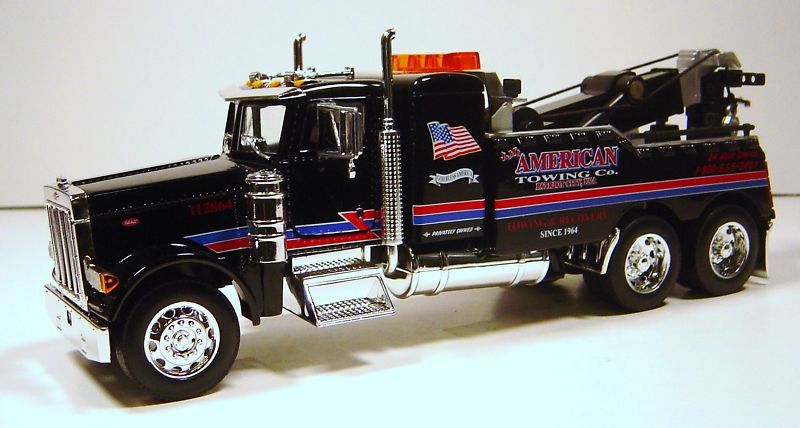 32 PETERBILT TOW TRUCK AMERICAN TOWING DIE CAST BLACK  