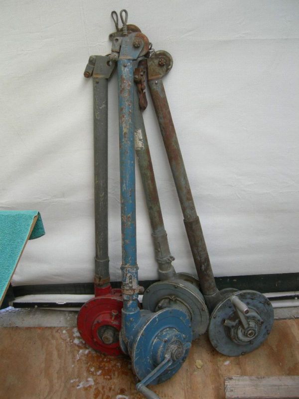   of FOUR (4) WW II NAVY BOMB/TORPEDO HOISTS, HAND CRANE, 1000LB. CAP